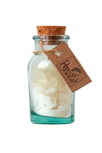 A jar of sea salt with a tag on it.