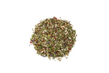 A pile of dried herbs on top of a white background.