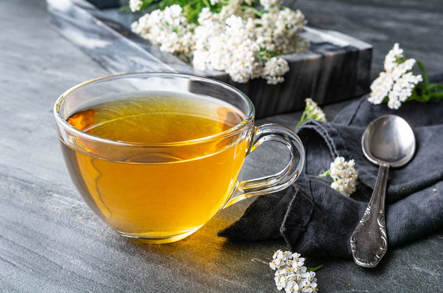 A cup of tea sitting on top of a table.