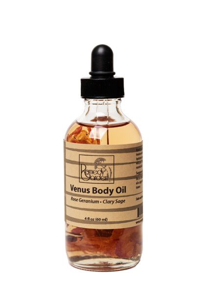 A bottle of venus body oil with the label